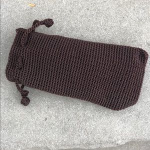 The sak brown sunglass case